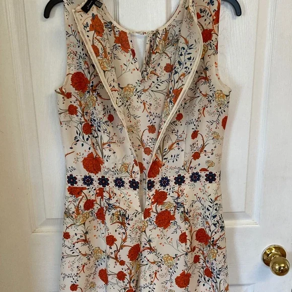 Jasmine & Juliana Floral Sleeveless Romper in Cream Orange Blooms - Picture 8 of 11